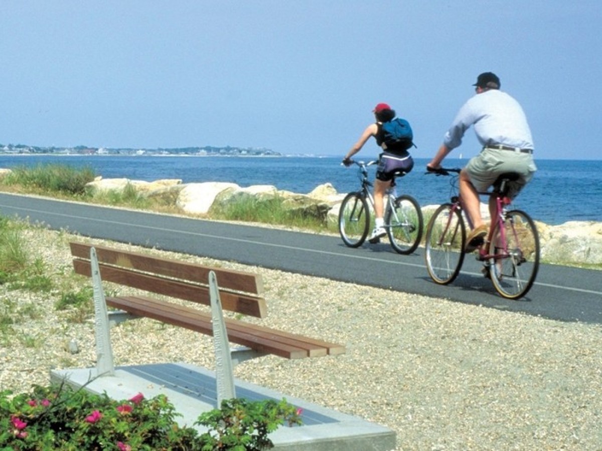 Two people biking on Cape Cod Canal with bike rentals from RideAway Adventures