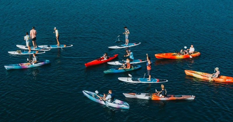 A group of kayaks during a tour of Lawrence Pond in Sandwich, Cape Cod